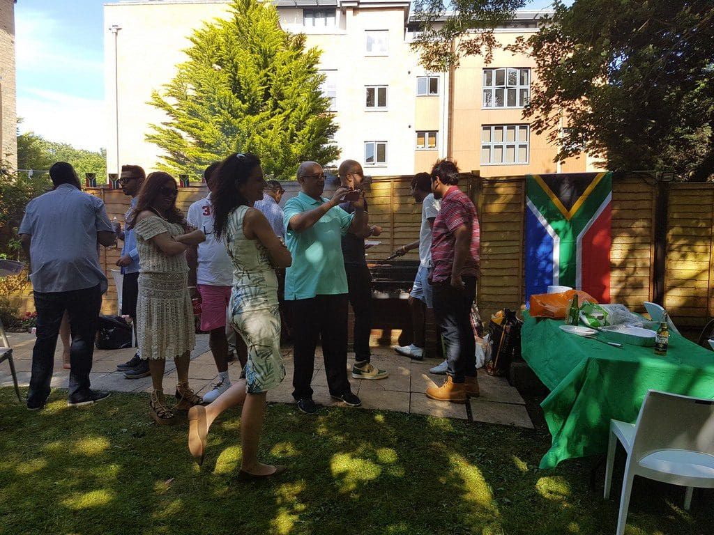Guests at a South African-themed garden party in Wimbledon
