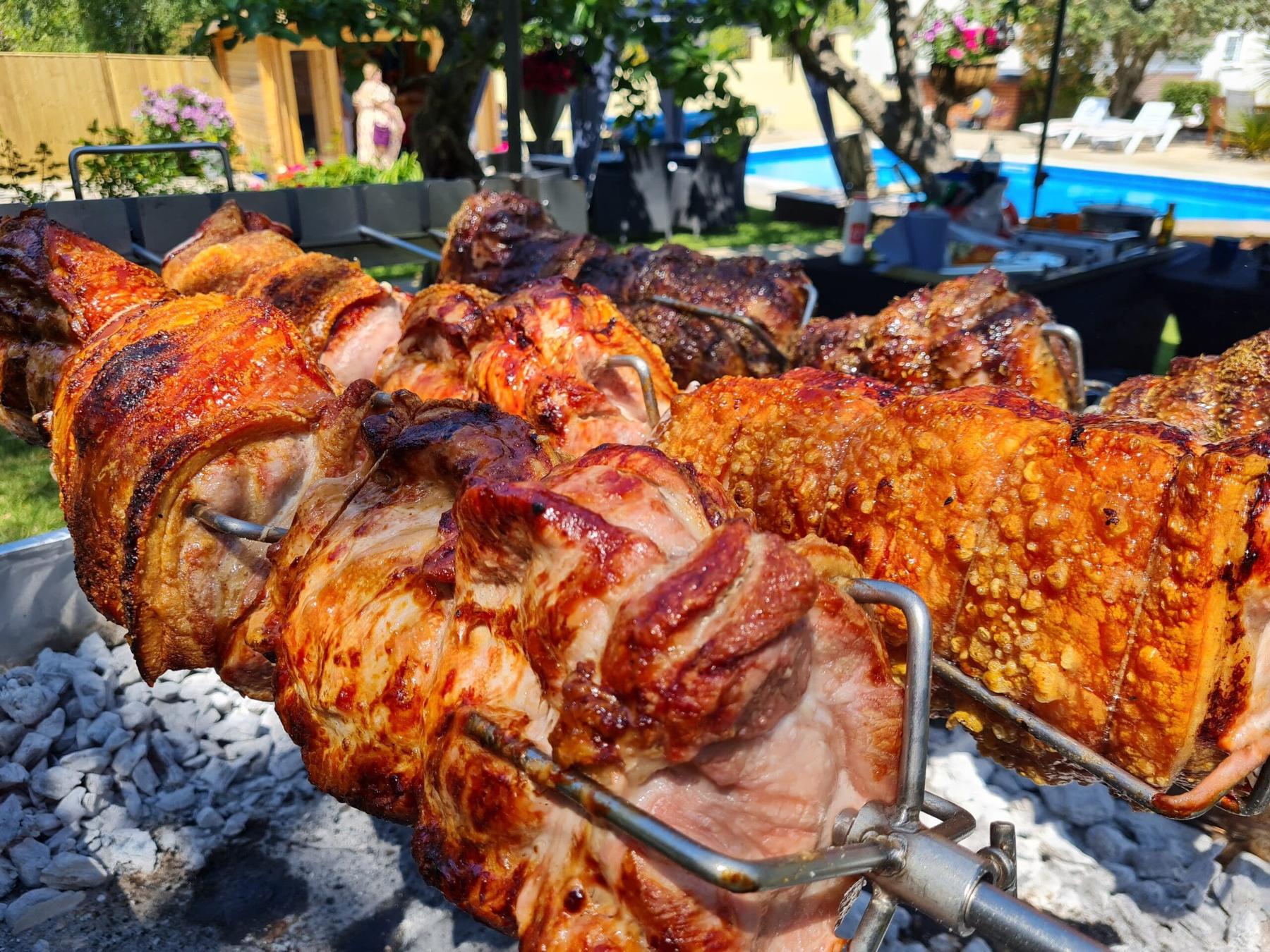 Pork loins with crackling turning over charcoal