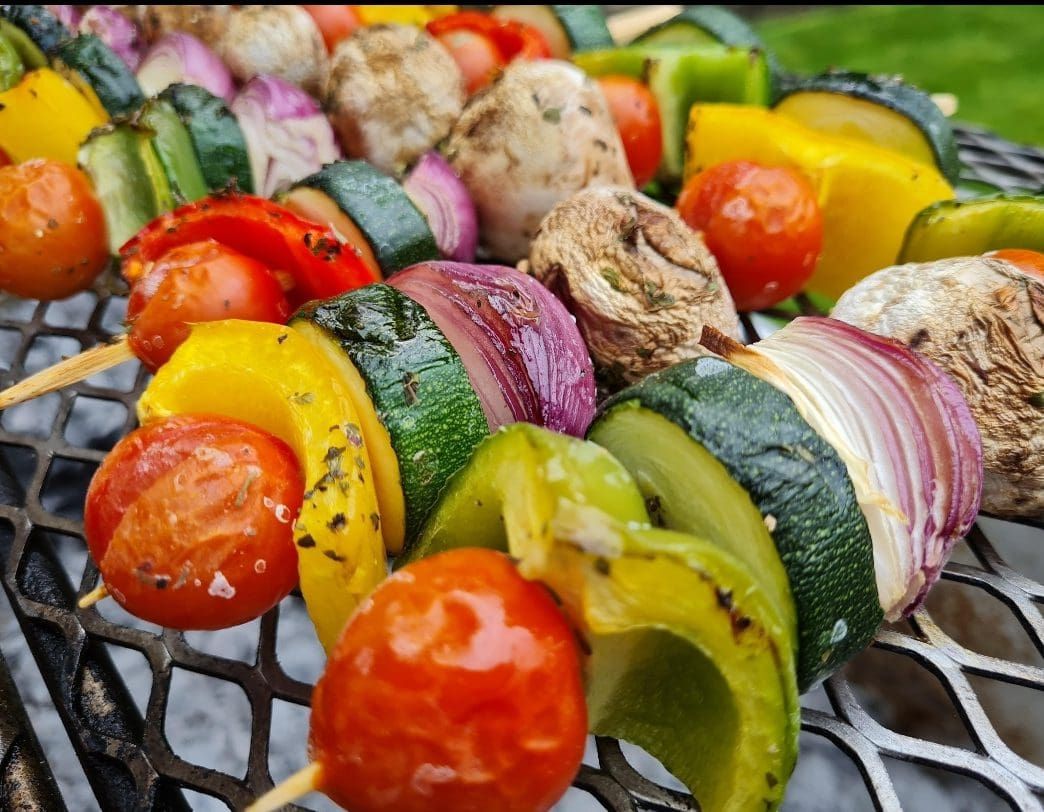 Colourful vegetable skewers on the grill