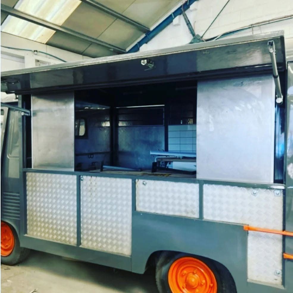 The new serving hatch open on the side of the half-built food truck